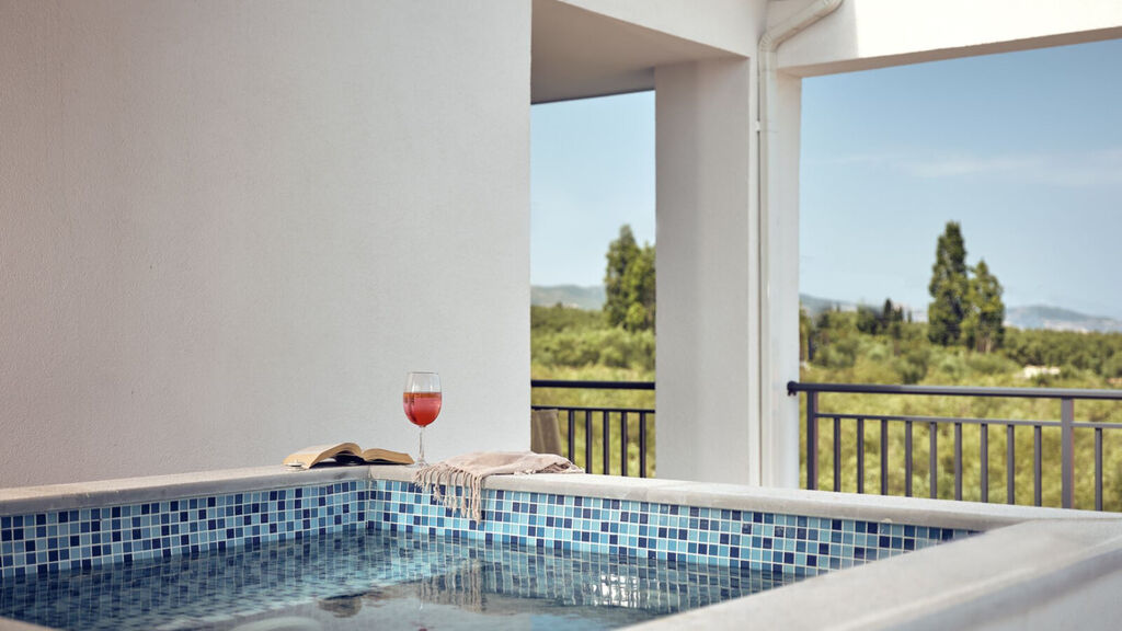 Cavo Orient Beach Hotel & Suites